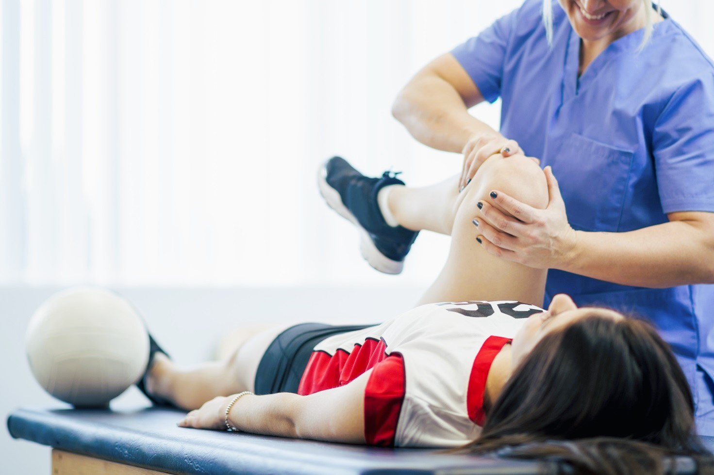 Female athlete receives examination